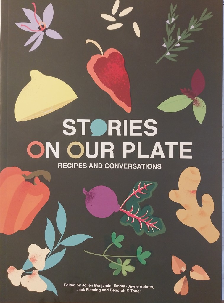 Book cover, Stories on our Plate: Recipes and Conversation. Stylised, colourful images of different vegetables on a dark green background